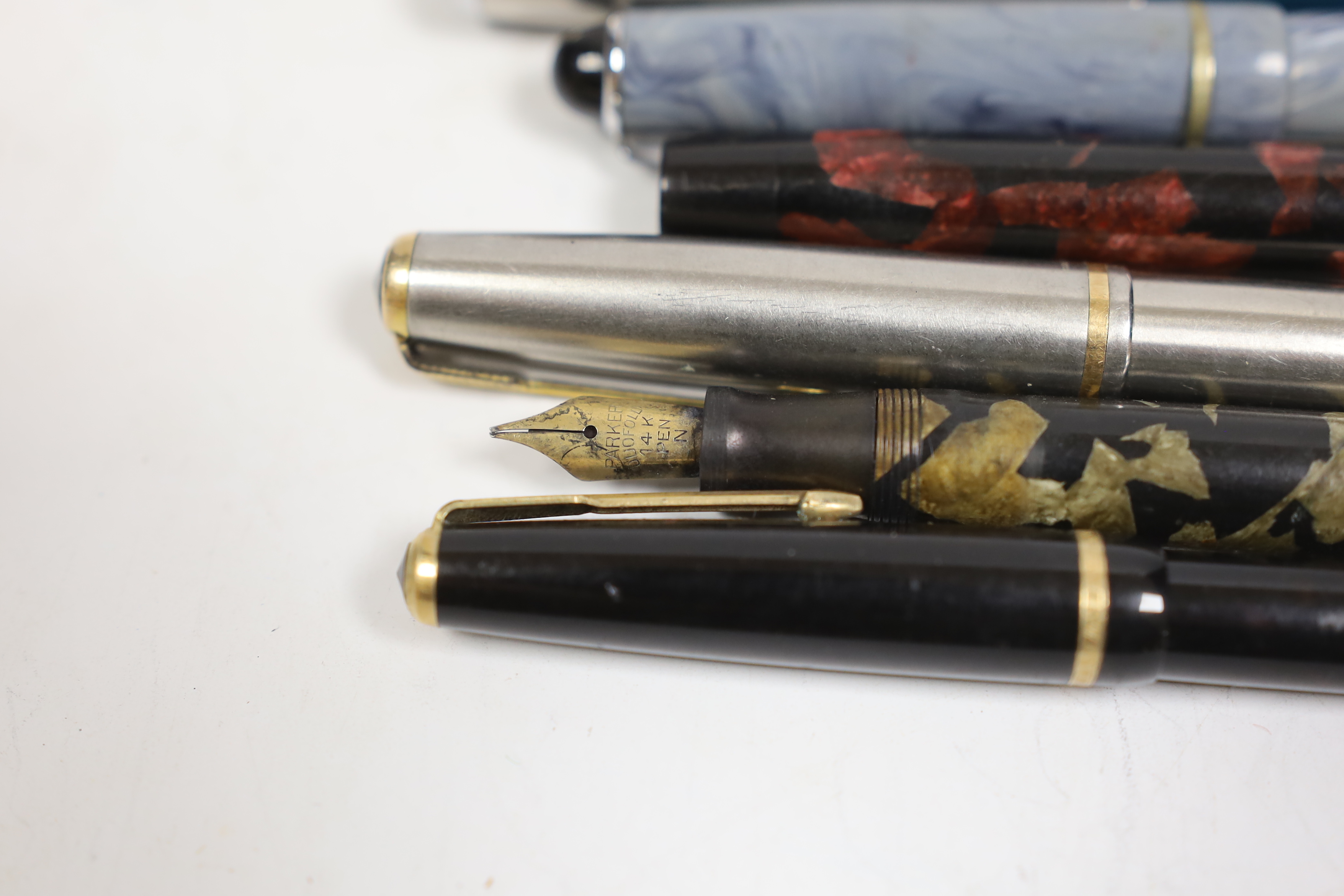 A collection of thirteen fountain pens by Parker, Mabie Todd, etc.